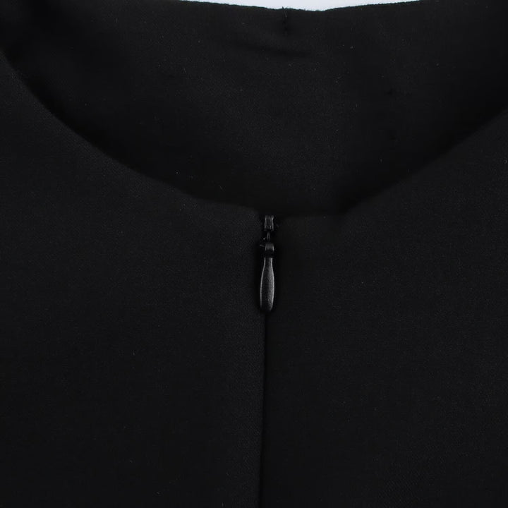 The Elara Keyhole Zip Fitted  Peplum Top