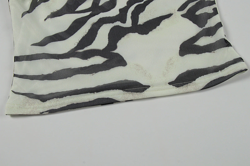 The Elara Zebra Muse Backless Maxi Dress