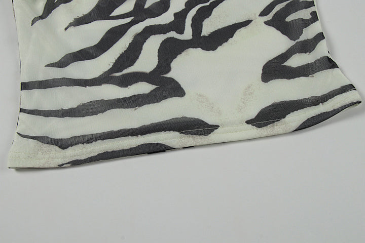 The Elara Zebra Muse Backless Maxi Dress
