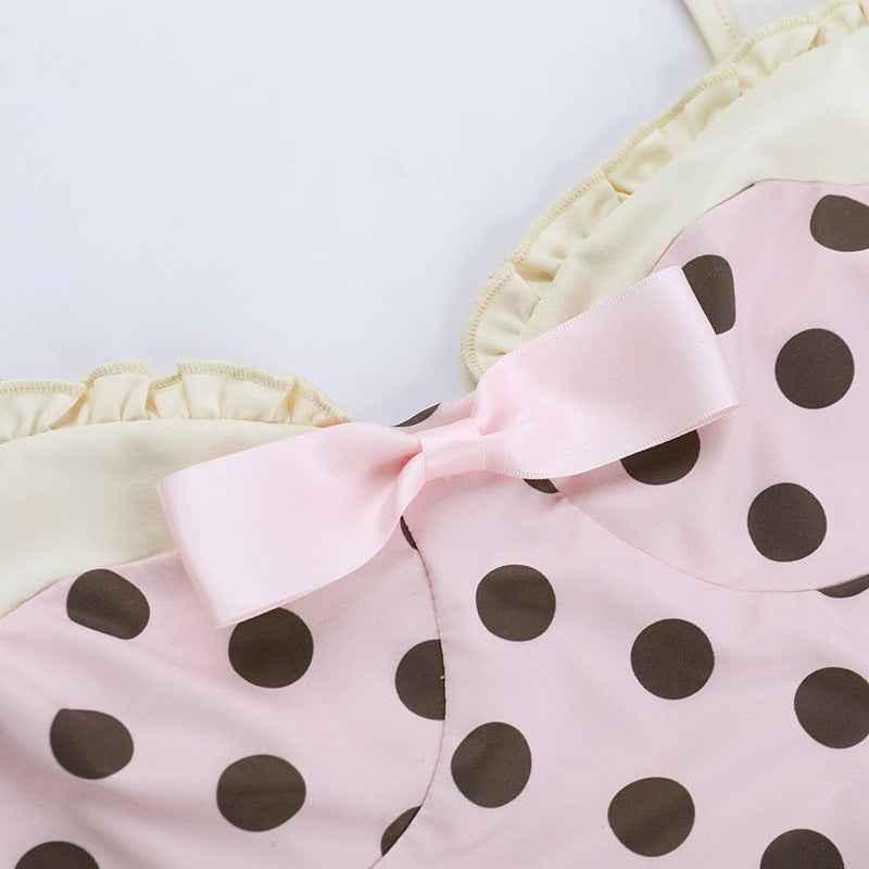 The Elara Polka Dot Bow Mini Dress
