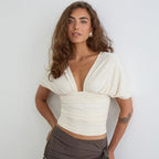 The Elara Draped Batwing V-Neck Blouse