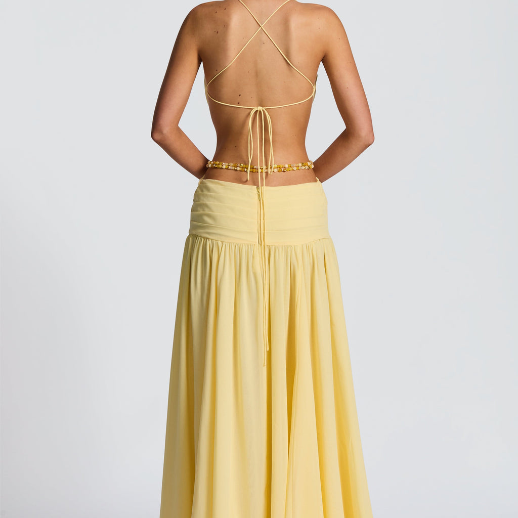 The Elara Deep V Backless Orchid Brooch Gown