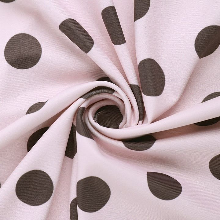 The Elara Polka Dot Bow Mini Dress