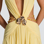 The Elara Deep V Backless Orchid Brooch Gown