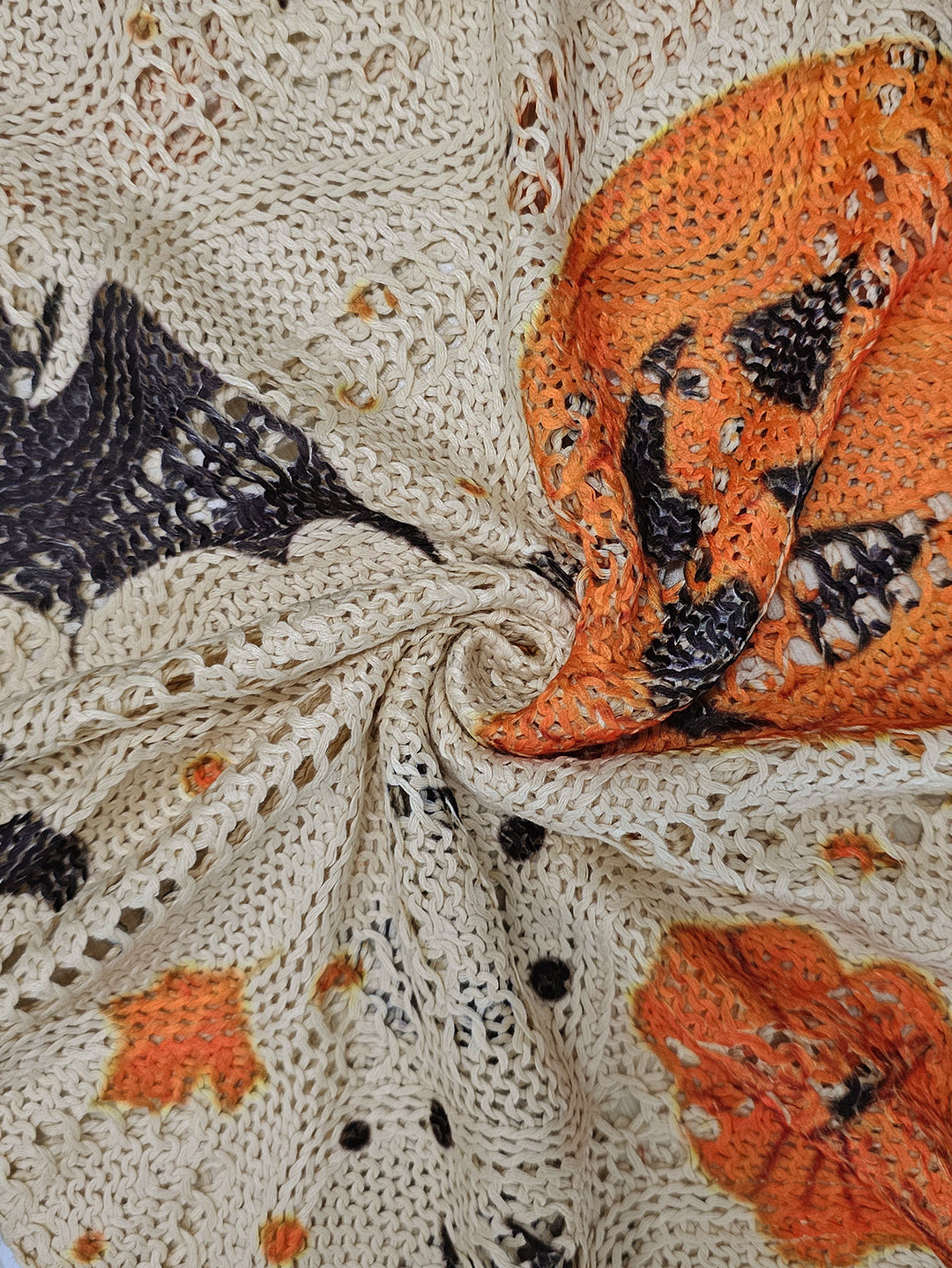 The Elara Pumpkin Night Openwork Sweater