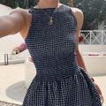 The Elara Riviera Gingham Smocked Mini