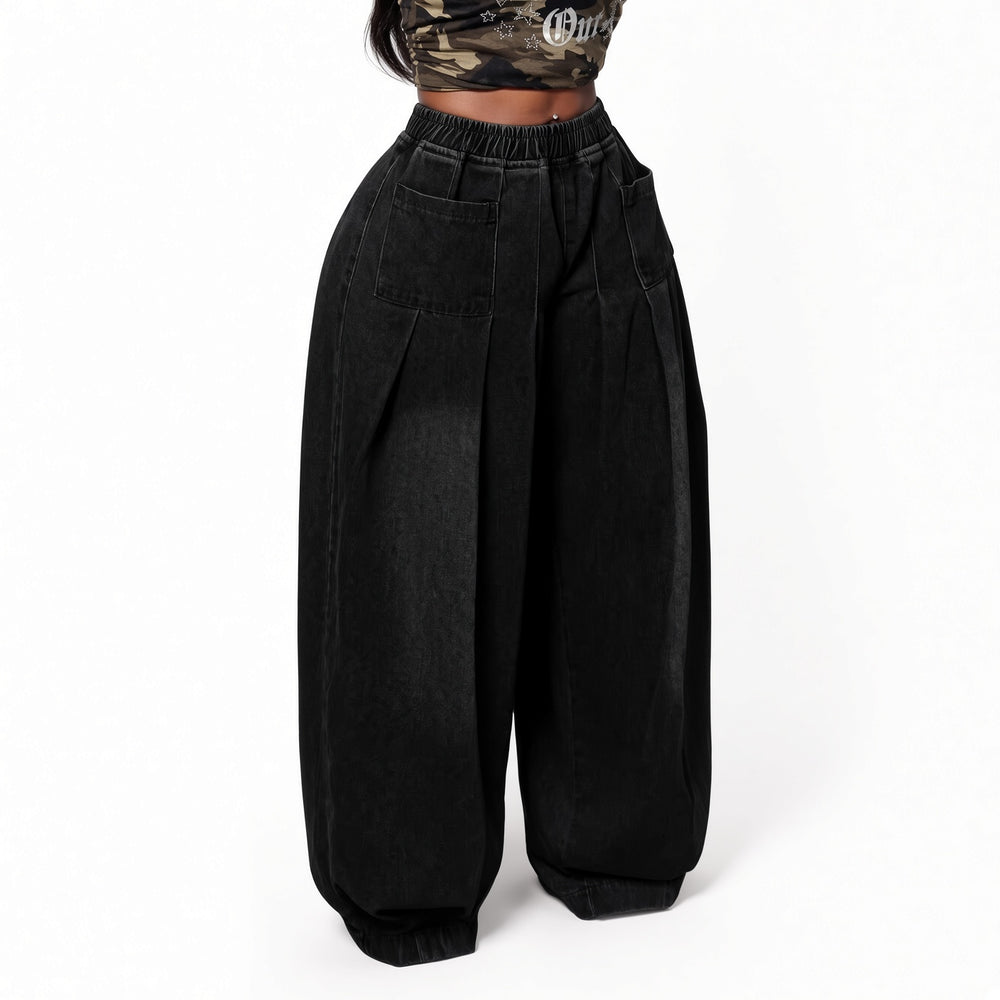 The Elara stretch wide-leg jeans in Black, front view