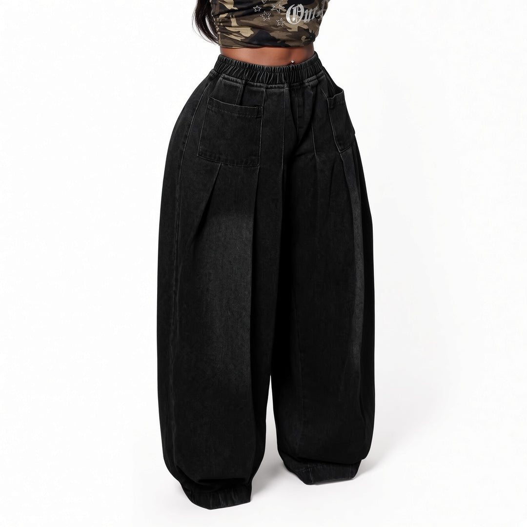 The Elara stretch wide-leg jeans in Black, front view