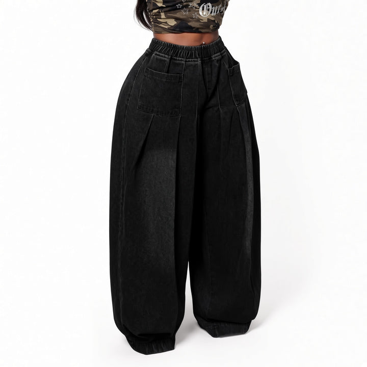 The Elara stretch wide-leg jeans in Black, front view