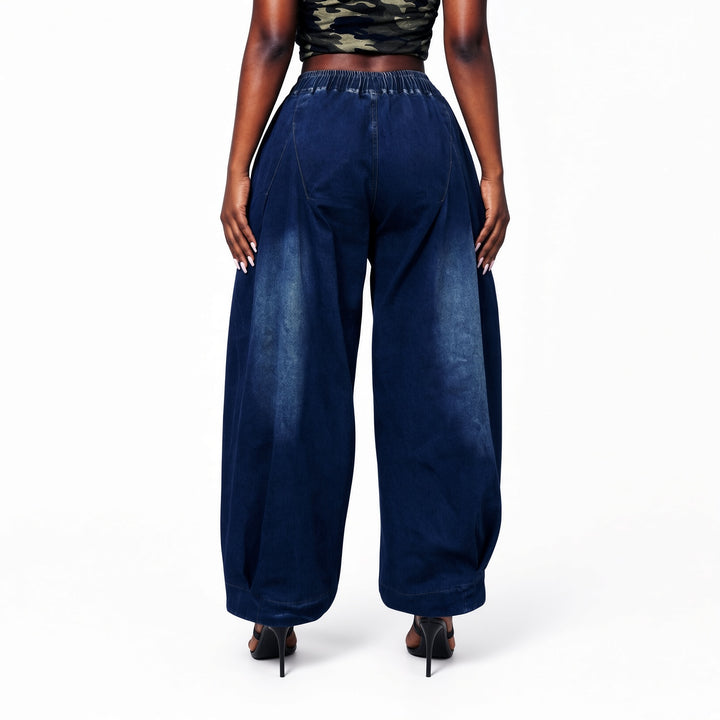 The Elara stretch wide-leg jeans in Dark Blue, back view
