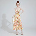 The Elara Ethereal Pleated Floral Cutout Maxi Dress