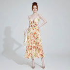 The Elara Ethereal Pleated Floral Cutout Maxi Dress