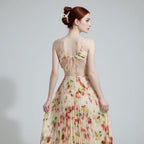 The Elara Ethereal Pleated Floral Cutout Maxi Dress