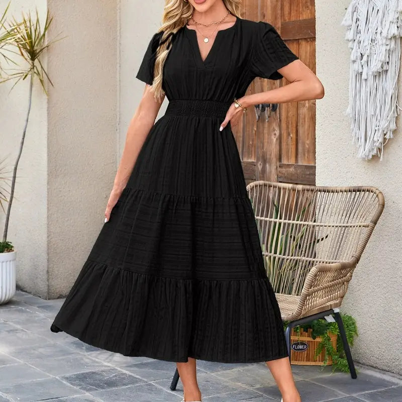 The Elara V-Neck Smocked Waist Tiered Maxi Dress