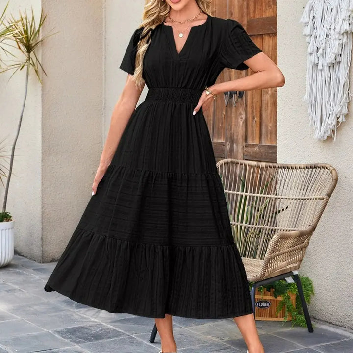 The Elara V-Neck Smocked Waist Tiered Maxi Dress
