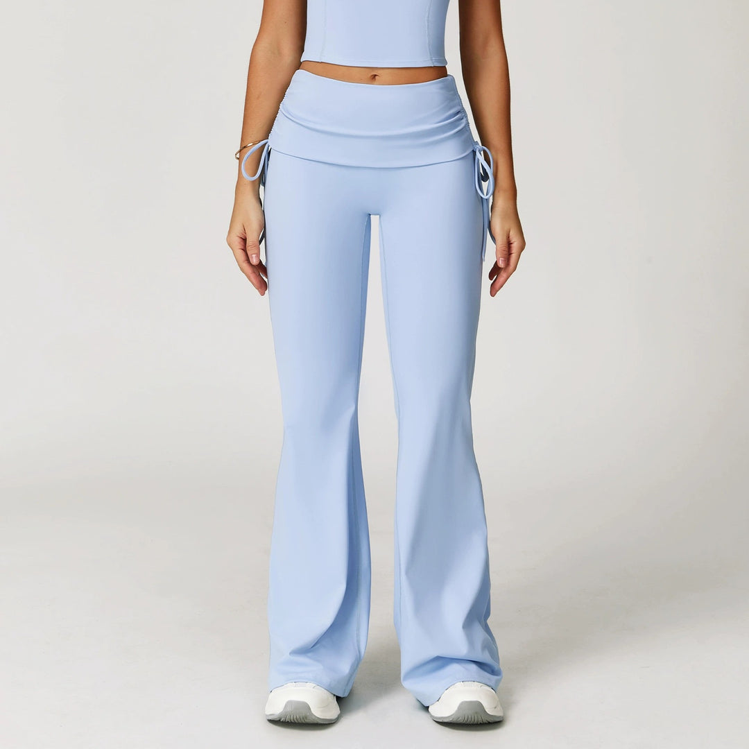 The Elara foldover high-waist flare pants in soft blue front view