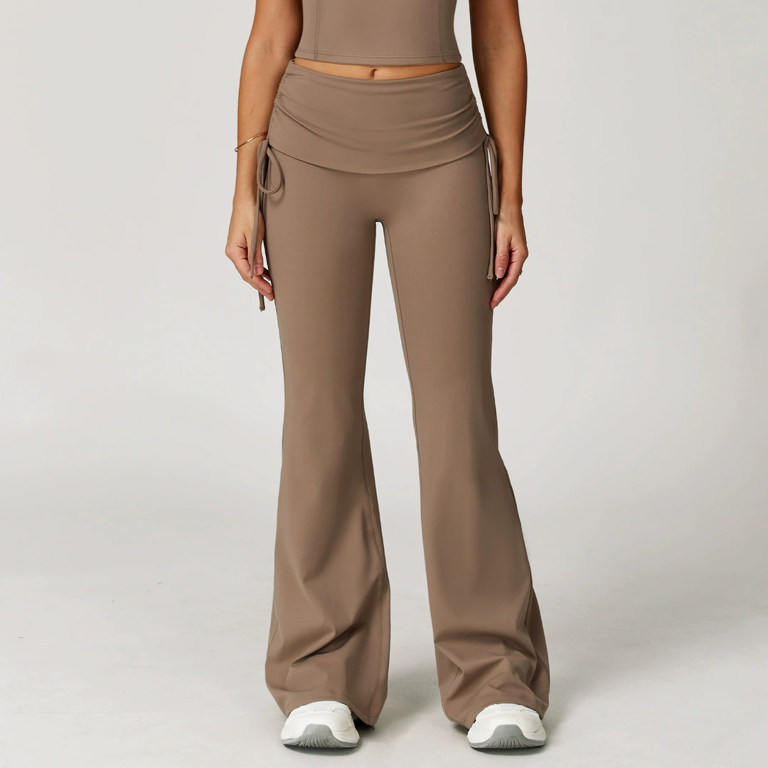 The Elara foldover high-waist flare pants in brown front view
