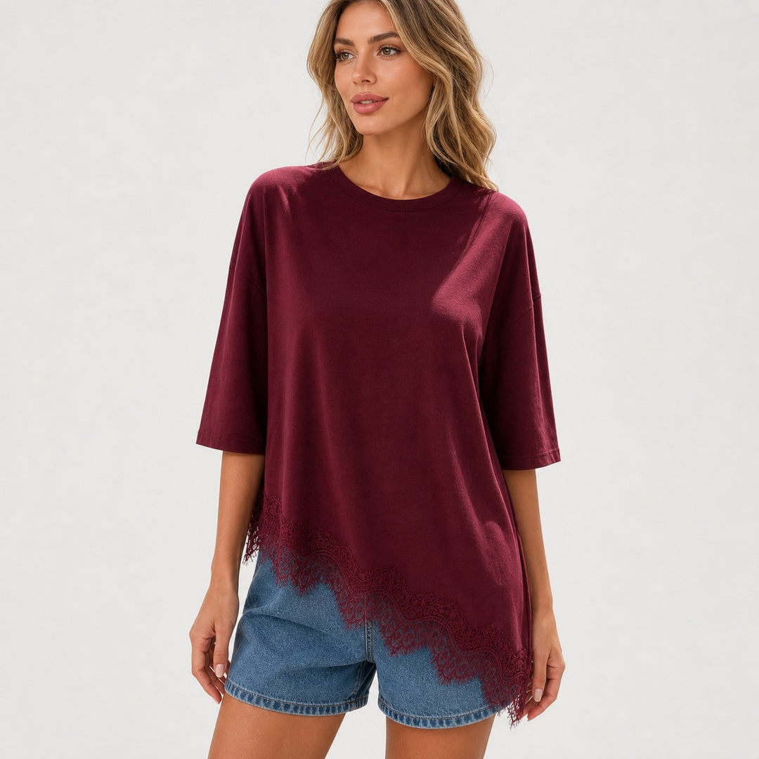The Elara lace-trim asymmetric hem tee in burgundy