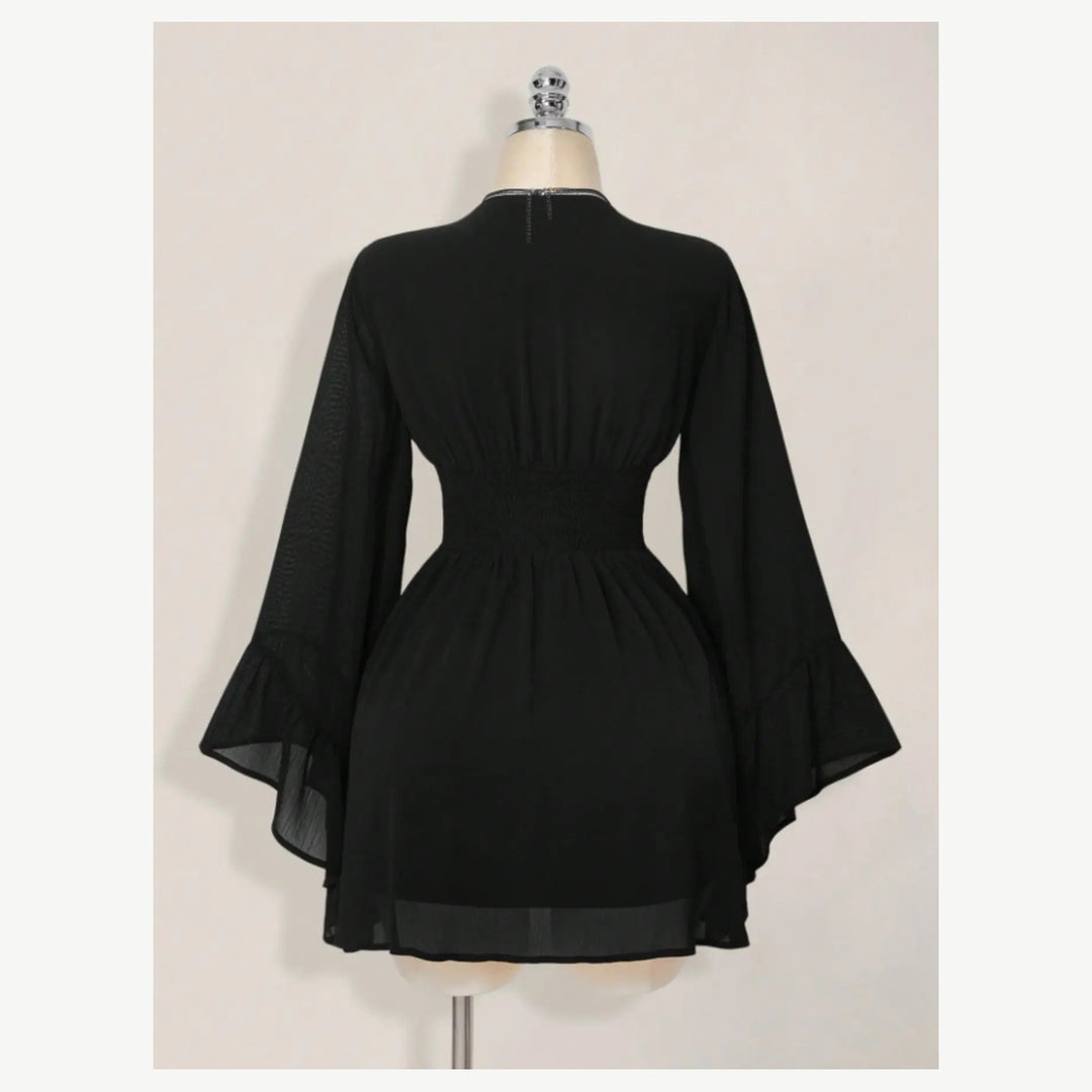 Back waist view of The Elara Gothic V-Neck Chiffon Mini Dress