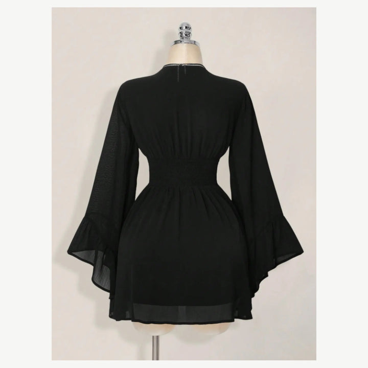 Back waist view of The Elara Gothic V-Neck Chiffon Mini Dress