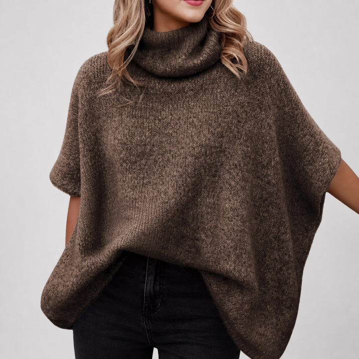 The Elara alpaca-blend turtleneck poncho in deep brown