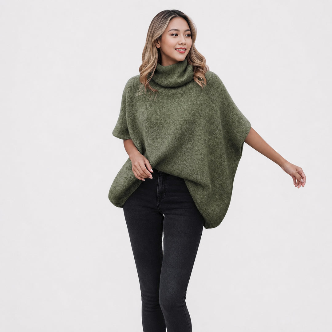 The Elara alpaca-blend turtleneck poncho in olive green