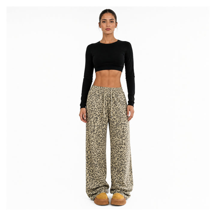 The Elara Relaxed Leopard Wide-Leg Pants in light yellow, front view