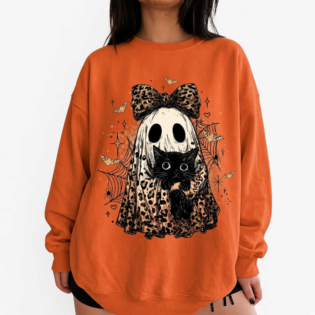 Orange leopard-bow ghost cat Halloween sweatshirt on model, front view
