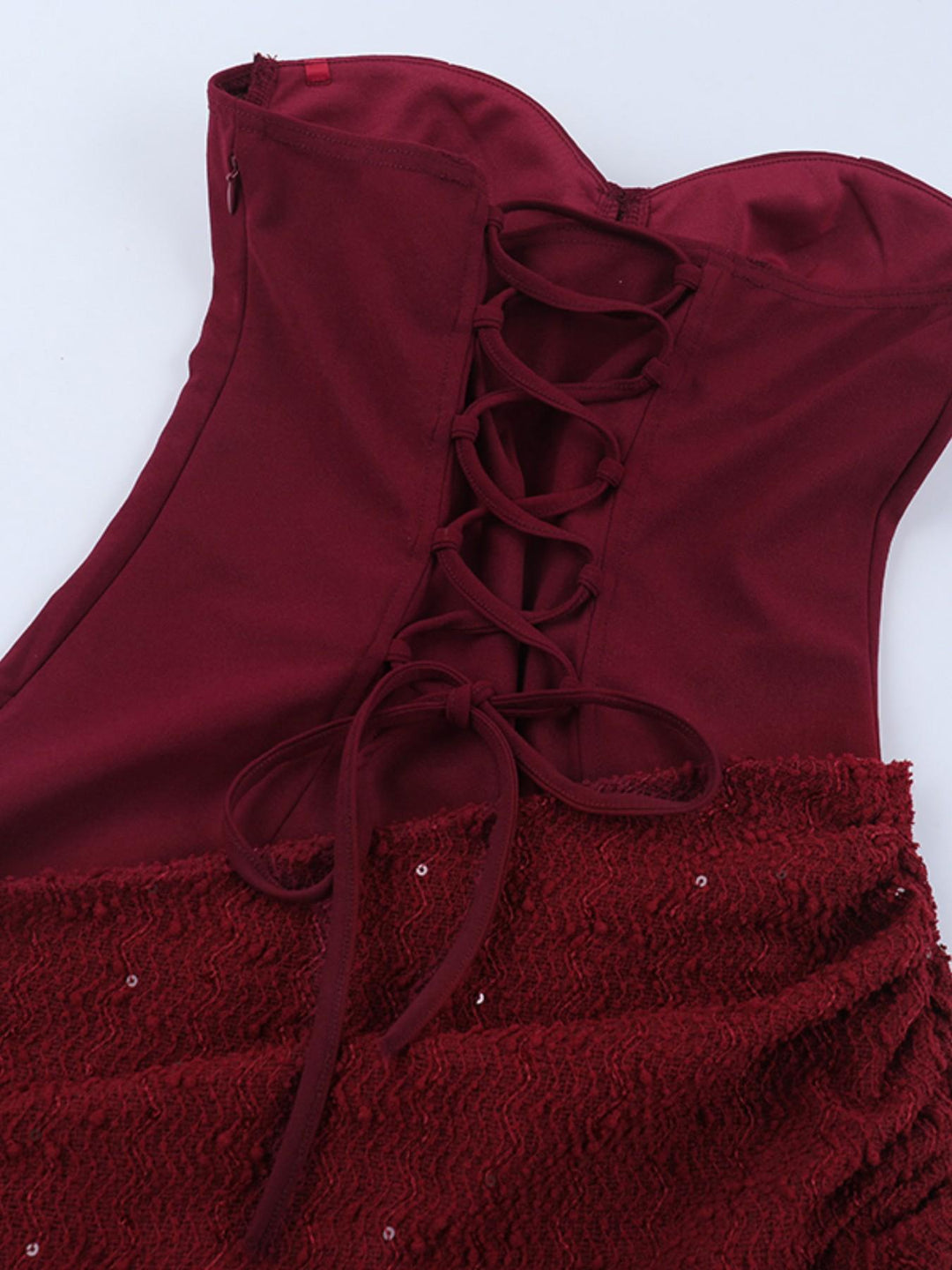 Burgundy back lace-up construction and sparkling fabric detail