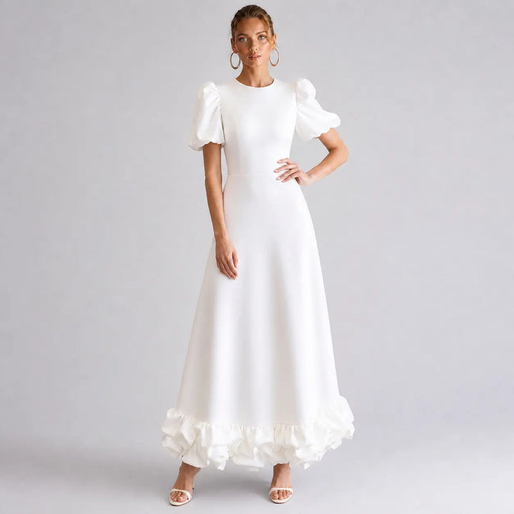 Ivory Amorette maxi dress in a three-quarter view