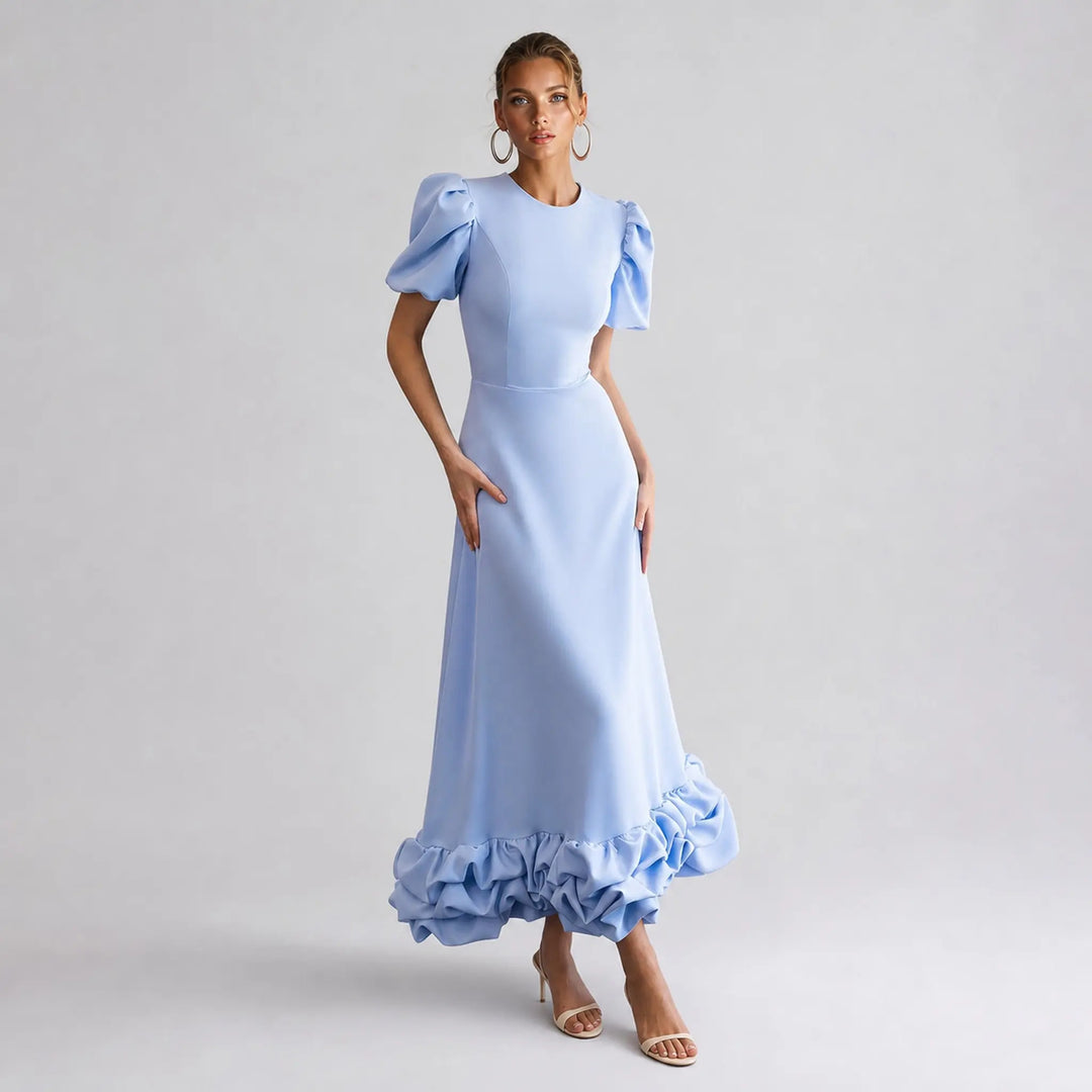 The Elara Amorette sculpted ruffle maxi dress in sky blue, front view