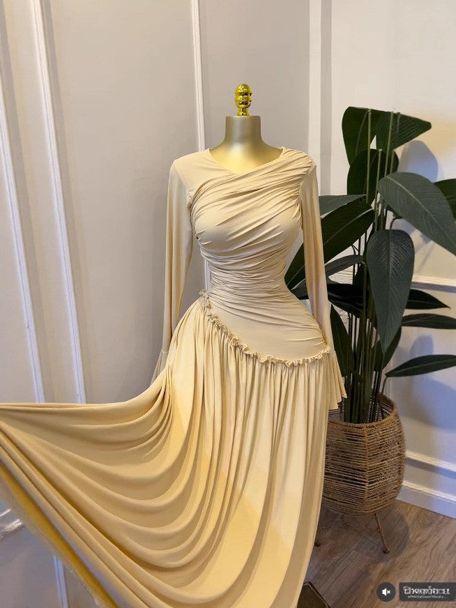 Light khaki ElaraSway dress showing the full flowing skirt