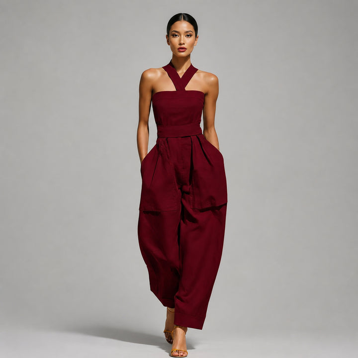 The Elara halter-neck linen-blend jumpsuit in Wine Red, front view