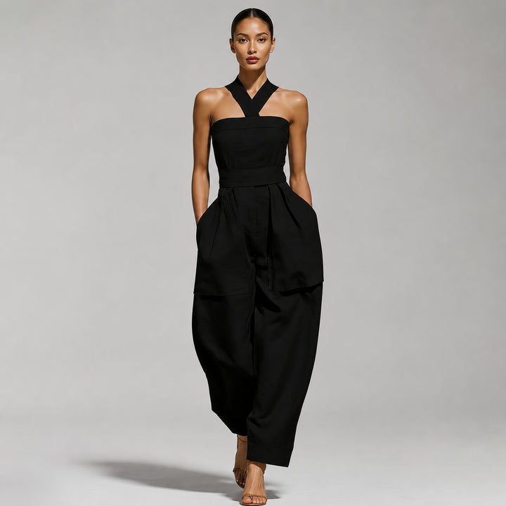 The Elara halter-neck linen-blend jumpsuit in Black, front view