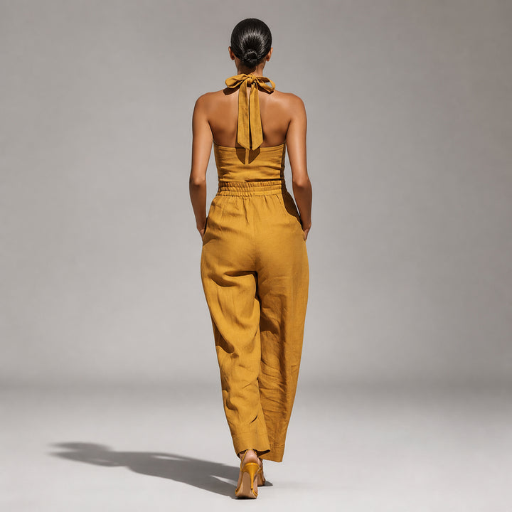 Sunflower linen-blend jumpsuit back view with halter tie and elasticized waist