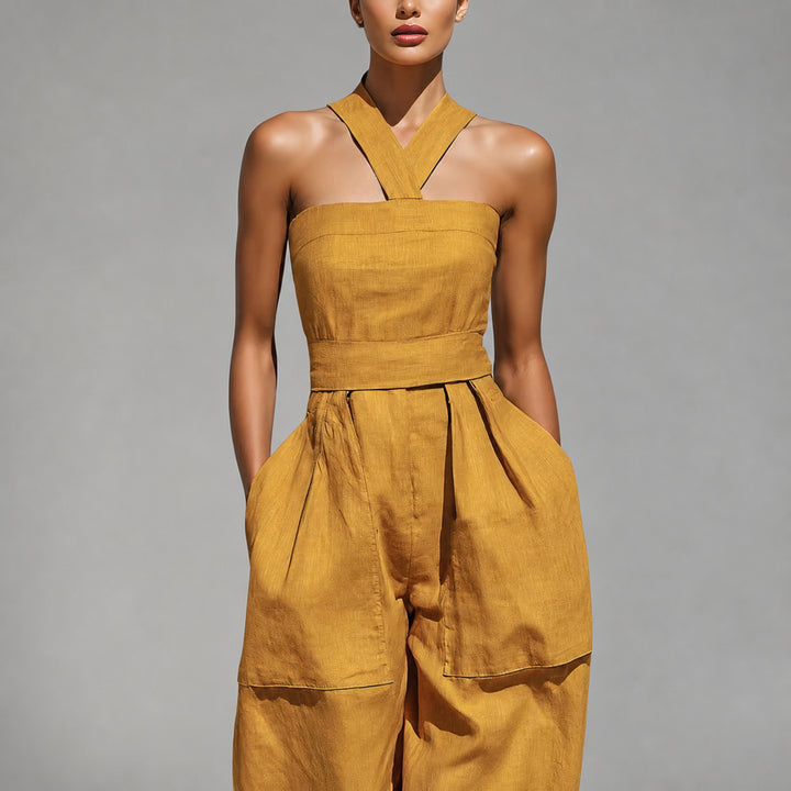 Crossed halter neckline, waist panel and oversized pocket detail