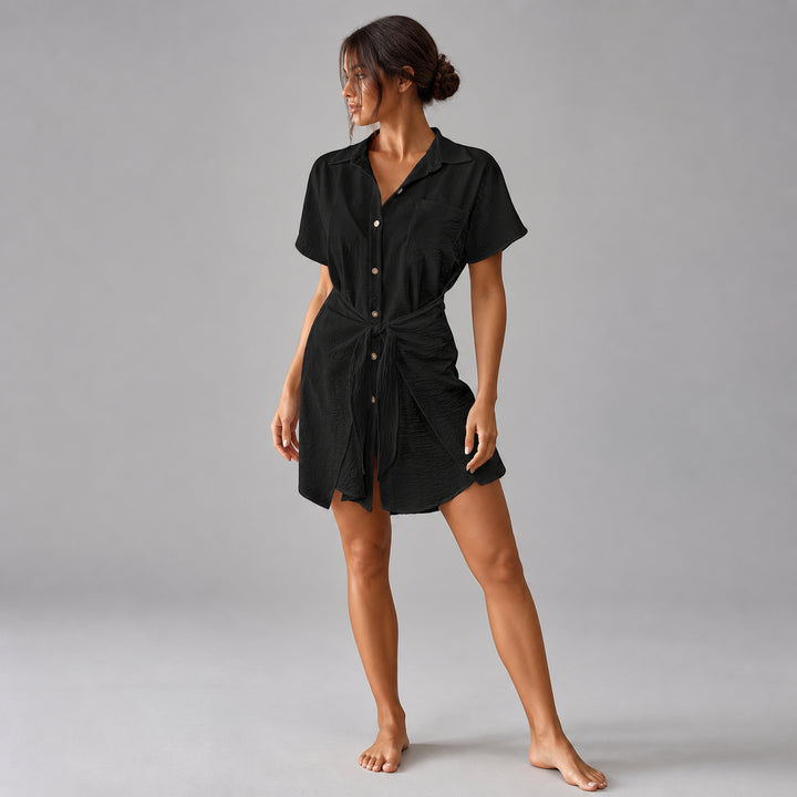 The Elara tie-waist cover-up shirt in Black, front view