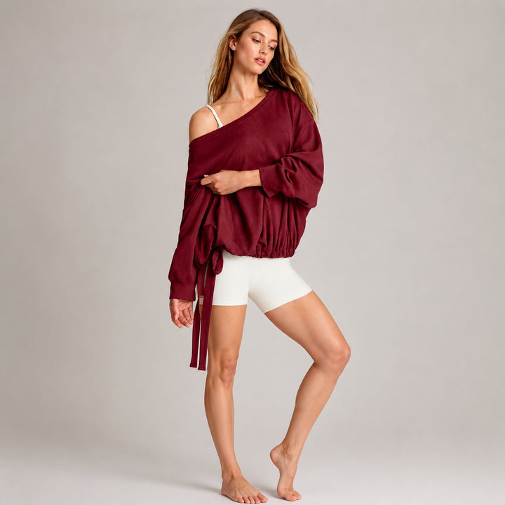 The Elara off-shoulder tie-hem sweatshirt in Burgundy