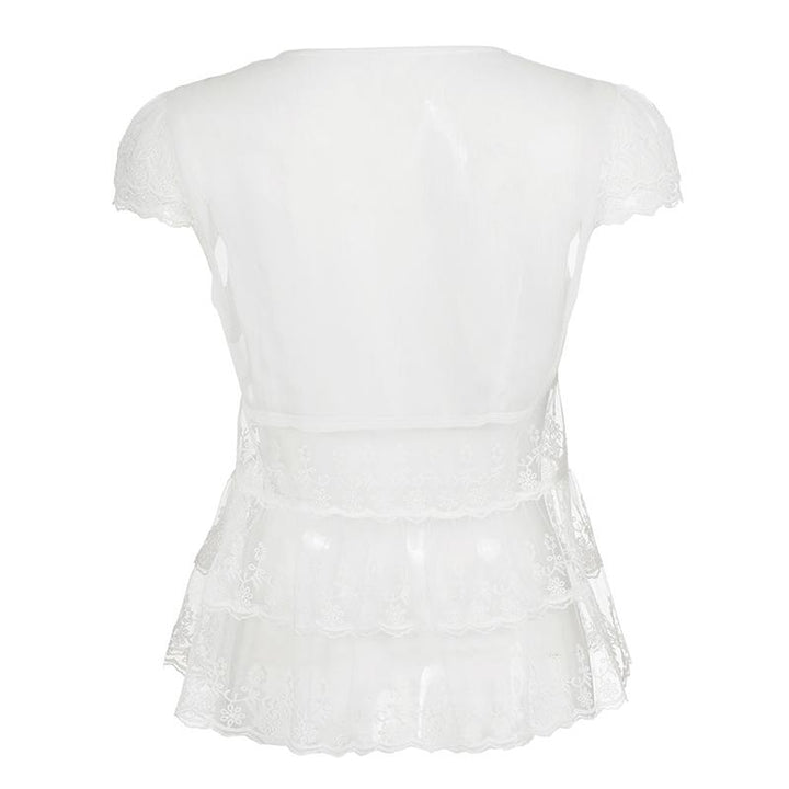 The Elara sheer lace peplum top front product view