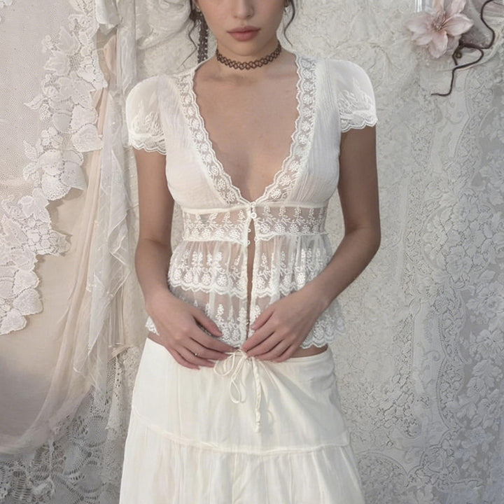 White lace peplum top styled with a long skirt