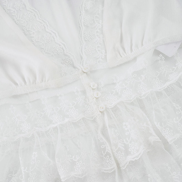 Covered button and lace waist construction detail