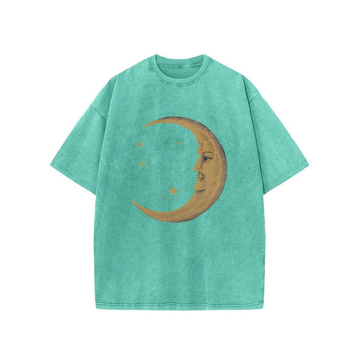 The Elara washed cotton crescent moon graphic T-shirt in Grass Green, front view