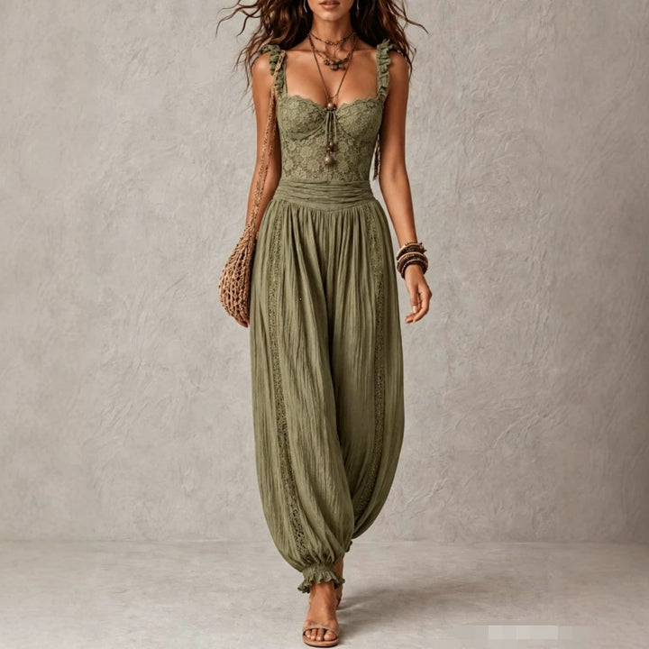 The Elara lace-bodice draped jumpsuit in Green, front view