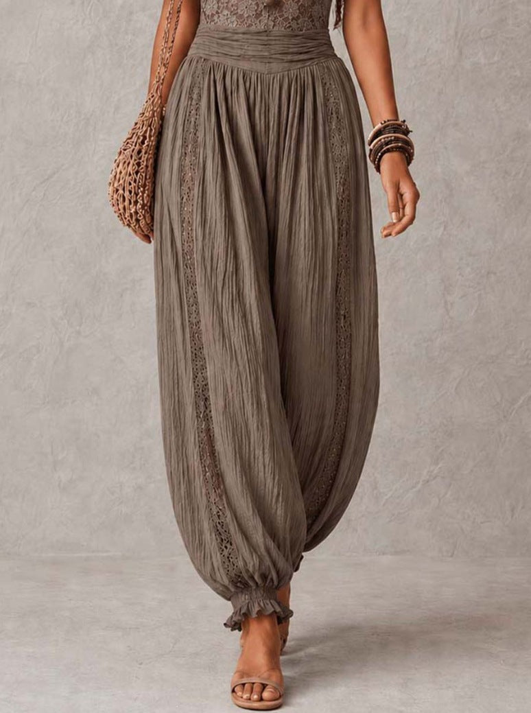 The Elara Gray jumpsuit lace bodice and draped leg detail