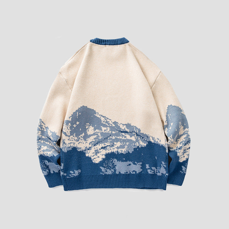 The Elara mountain scene knit sweater in Blue, back view