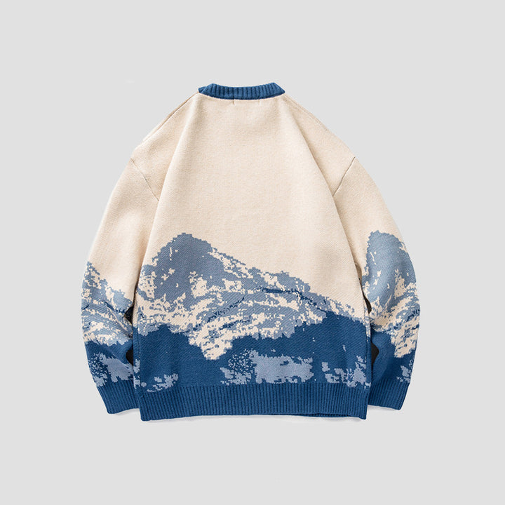 The Elara mountain scene knit sweater in Blue, back view