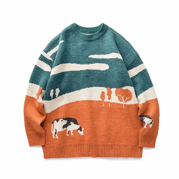 The Elara pasture scene knit sweater in Teal and Orange, front view