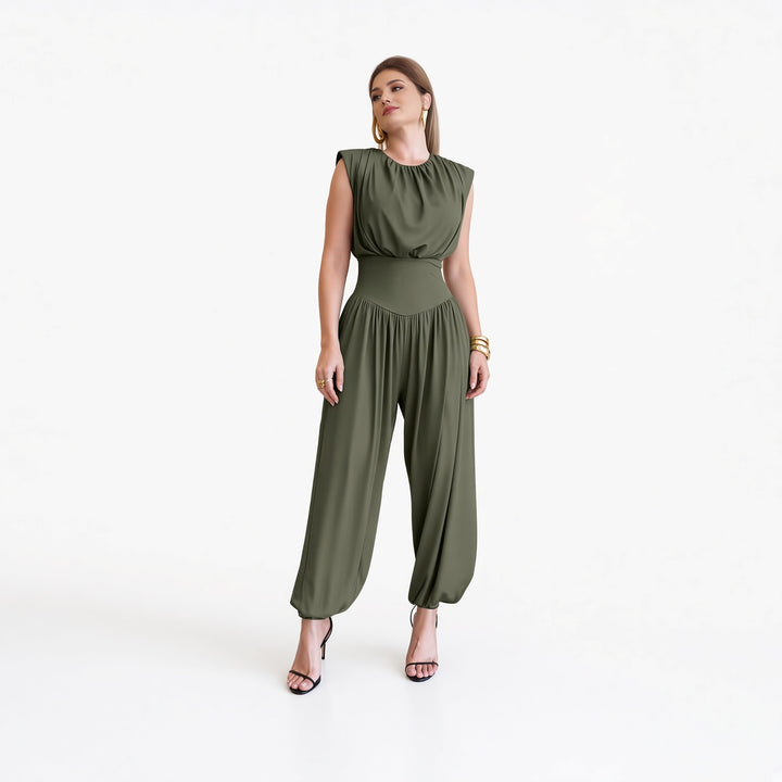 The Elara padded-shoulder harem jumpsuit in Army Green, front view