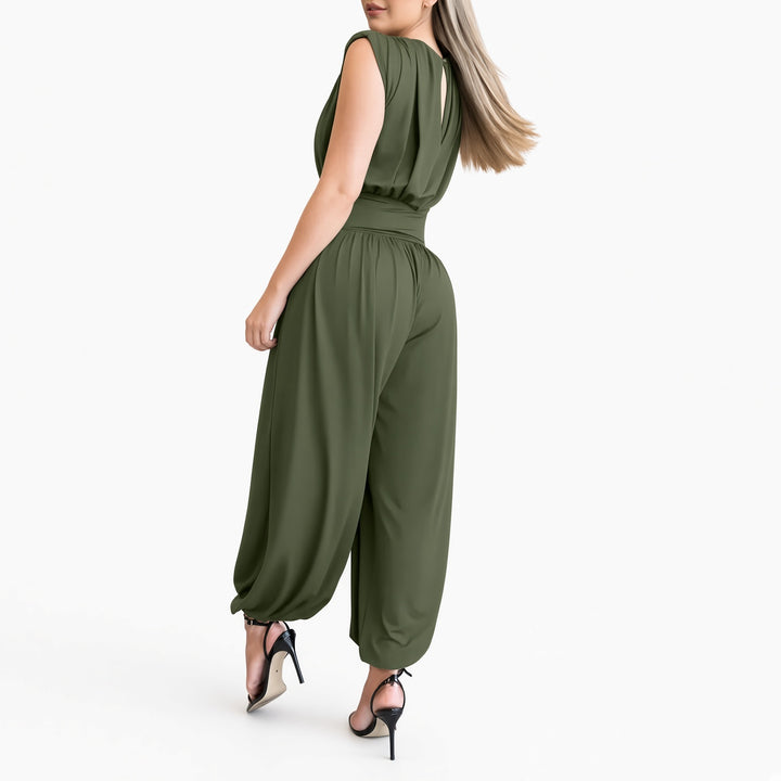 The Elara padded-shoulder harem jumpsuit in Army Green, back view
