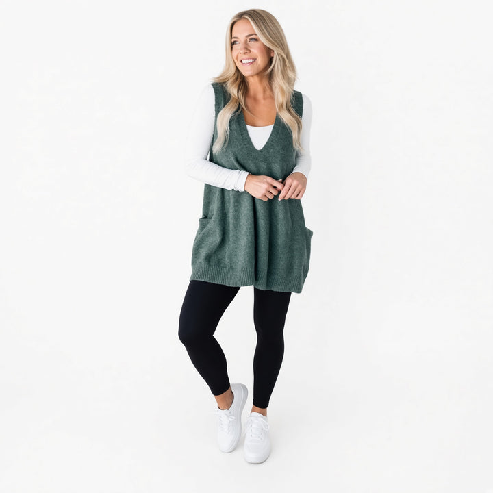 The Elara longline pocket sweater vest in Peacock Green, front view